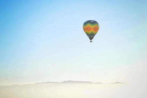 balloon blue, yellow, and red hot air balloon napa valley